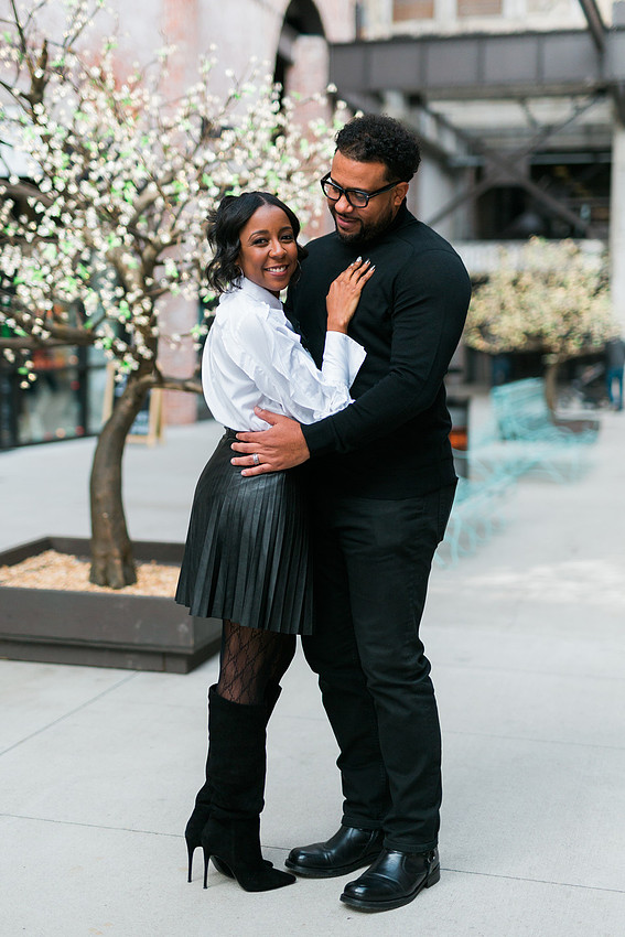 Joyful family moment captured outdoors at Ponce City Market during the holidays.