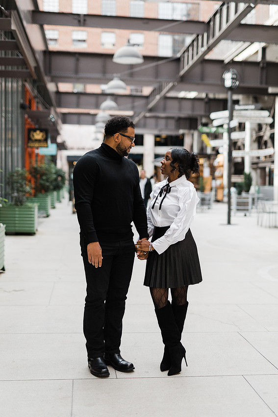Joyful family moment captured outdoors at Ponce City Market during the holidays.