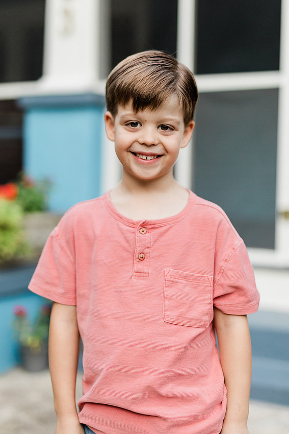 Golden hour family photos on west-facing porch with warm, flattering light for porch photography.