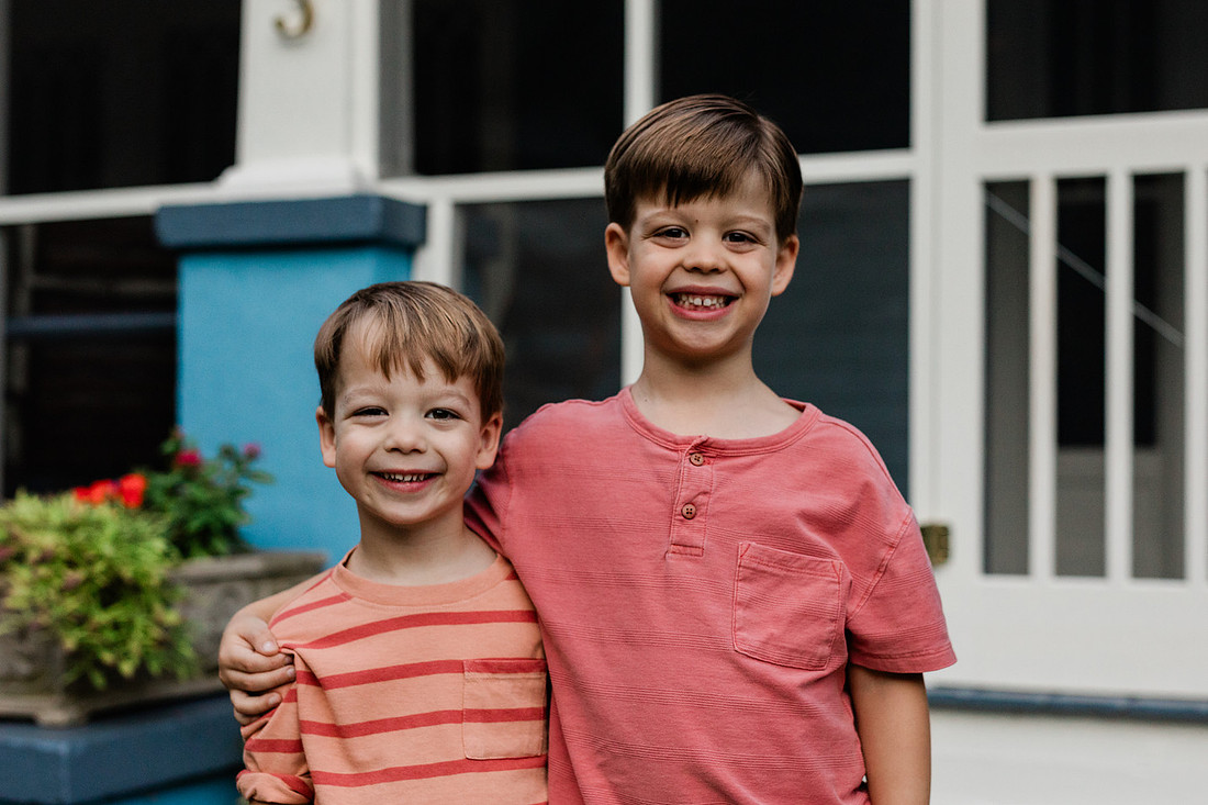 Golden hour family photos on west-facing porch with warm, flattering light for porch photography.