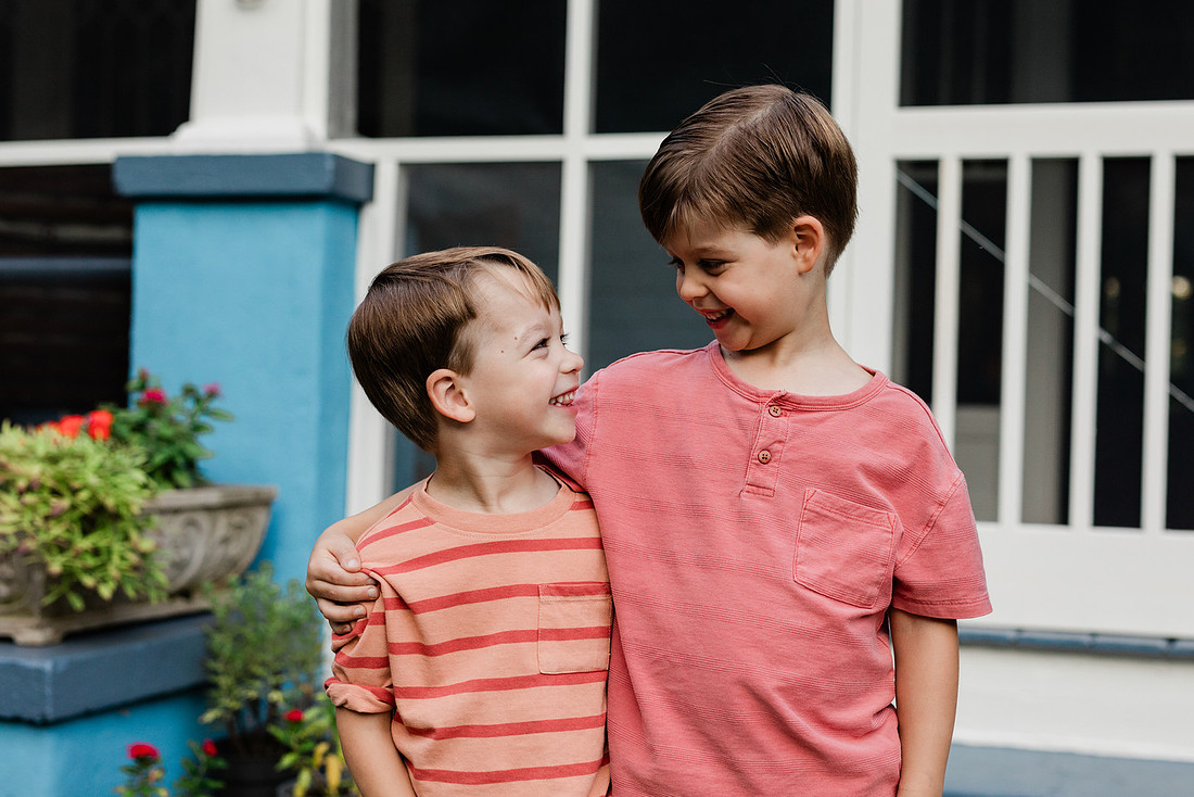 Golden hour family photos on west-facing porch with warm, flattering light for porch photography.