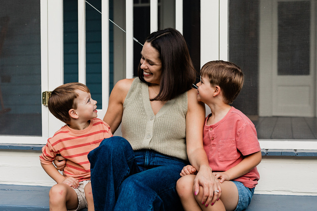 Golden hour family photos on west-facing porch with warm, flattering light for porch photography.