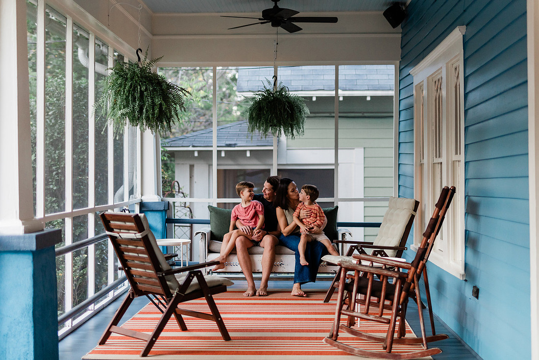 Golden hour family photos on west-facing porch with warm, flattering light for porch photography.