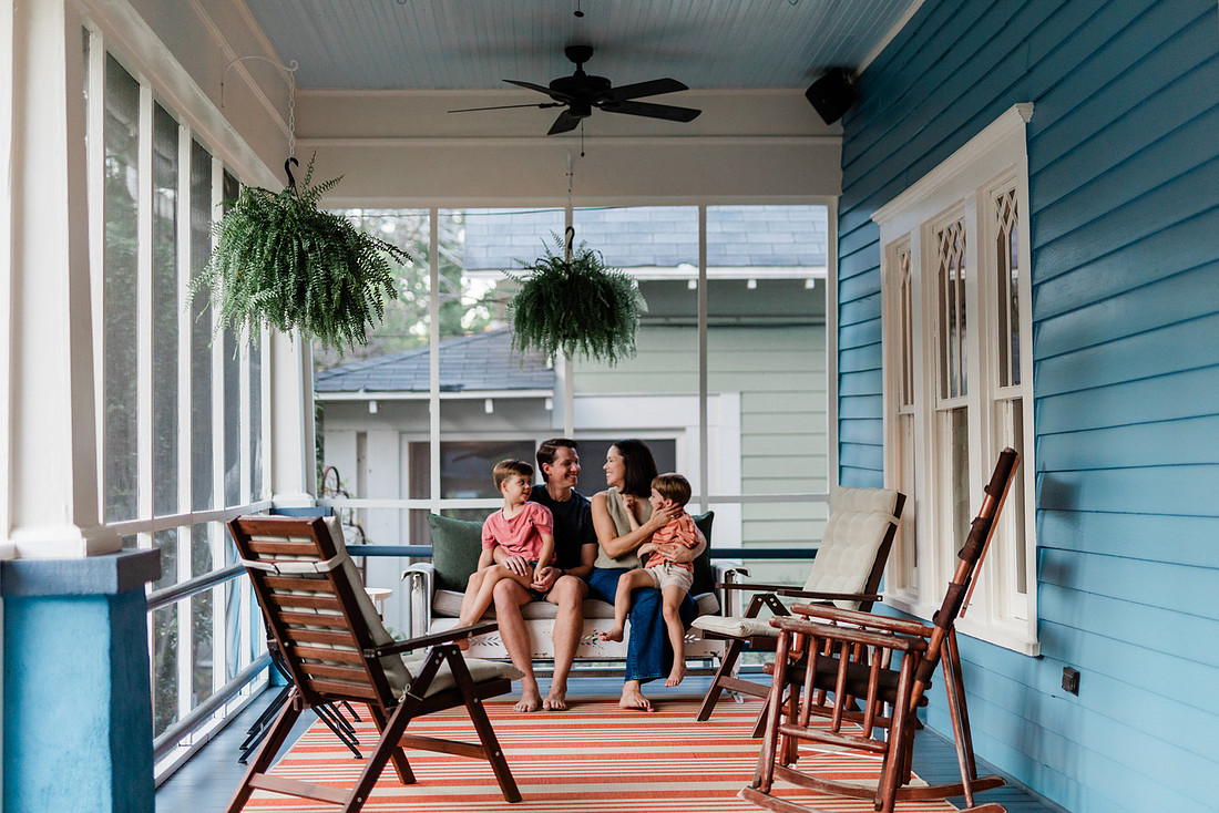 Golden hour family photos on west-facing porch with warm, flattering light for porch photography.