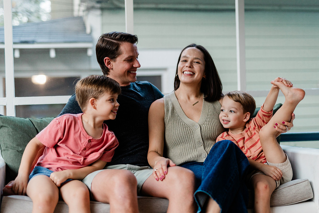 Golden hour family photos on west-facing porch with warm, flattering light for porch photography.
