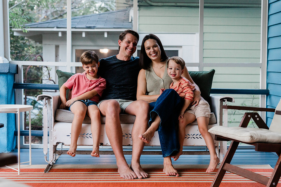 Golden hour family photos on west-facing porch with warm, flattering light for porch photography.