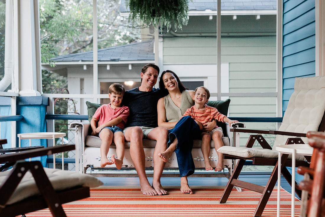 Golden hour family photos on west-facing porch with warm, flattering light for porch photography.