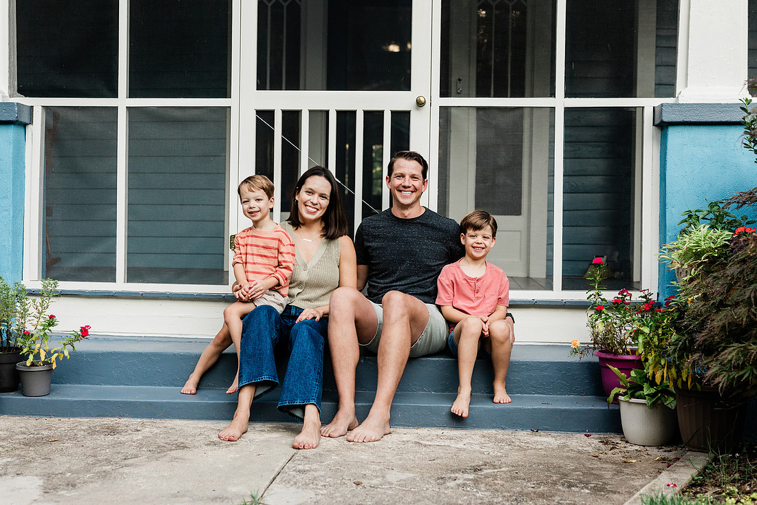 Golden hour family photos on west-facing porch with warm, flattering light for porch photography.