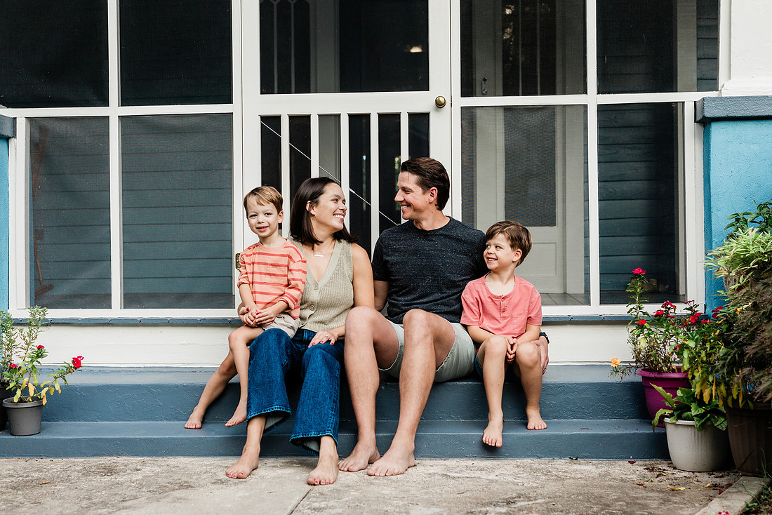 Golden hour family photos on west-facing porch with warm, flattering light for porch photography.
