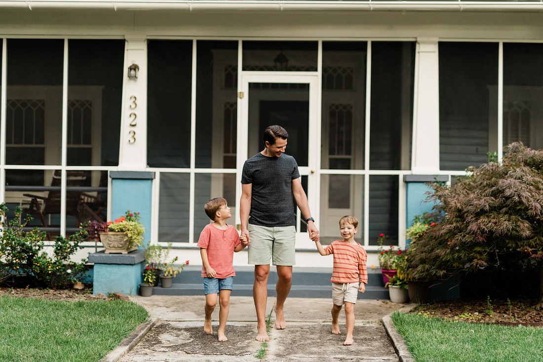 Golden hour family photos on west-facing porch with warm, flattering light for porch photography.