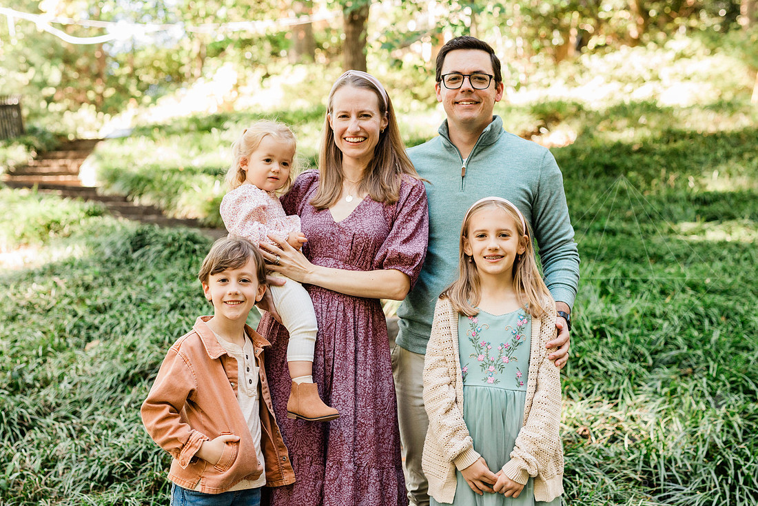 Outdoor spring family mini session capturing authentic smiles and connection