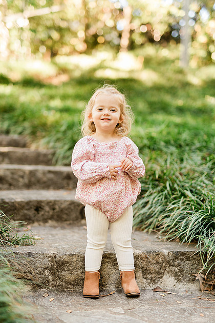 Outdoor spring family mini session capturing authentic smiles and connection