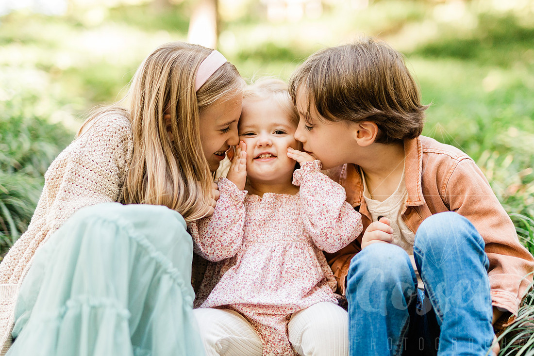 Outdoor spring family mini session capturing authentic smiles and connection