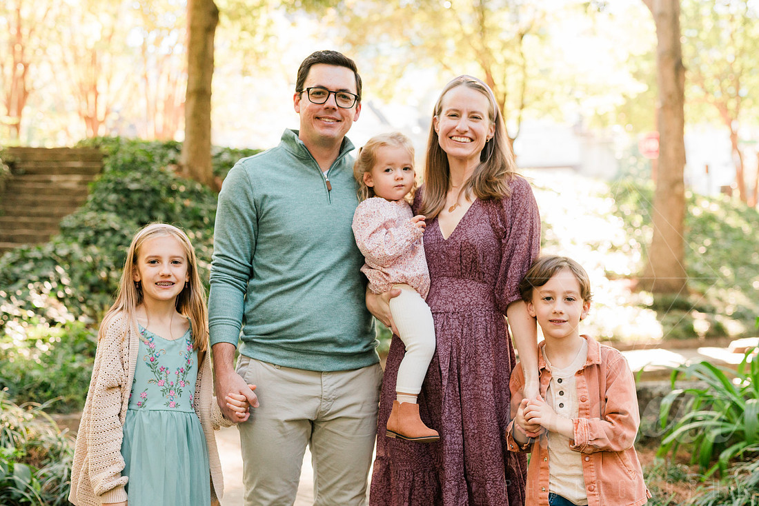 Outdoor spring family mini session capturing authentic smiles and connection