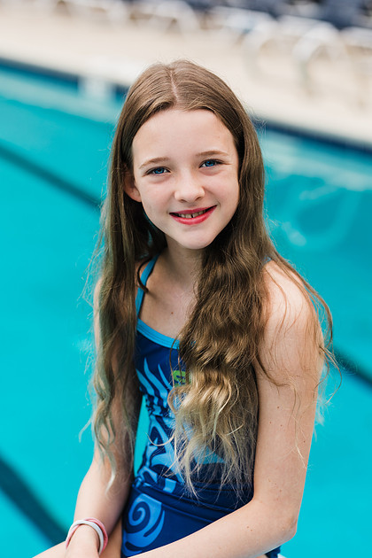 swimmers at swim meets and posing for portraits