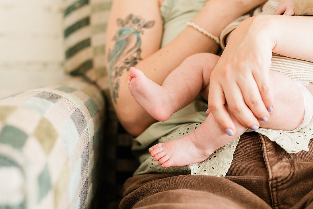 Family in their home welcoming baby