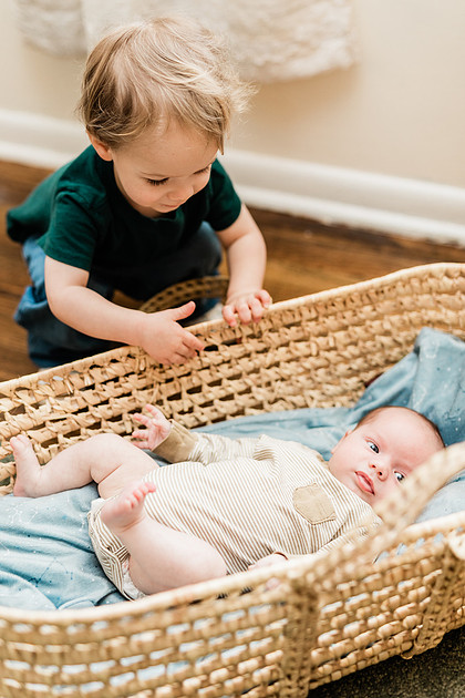 Family in their home welcoming baby