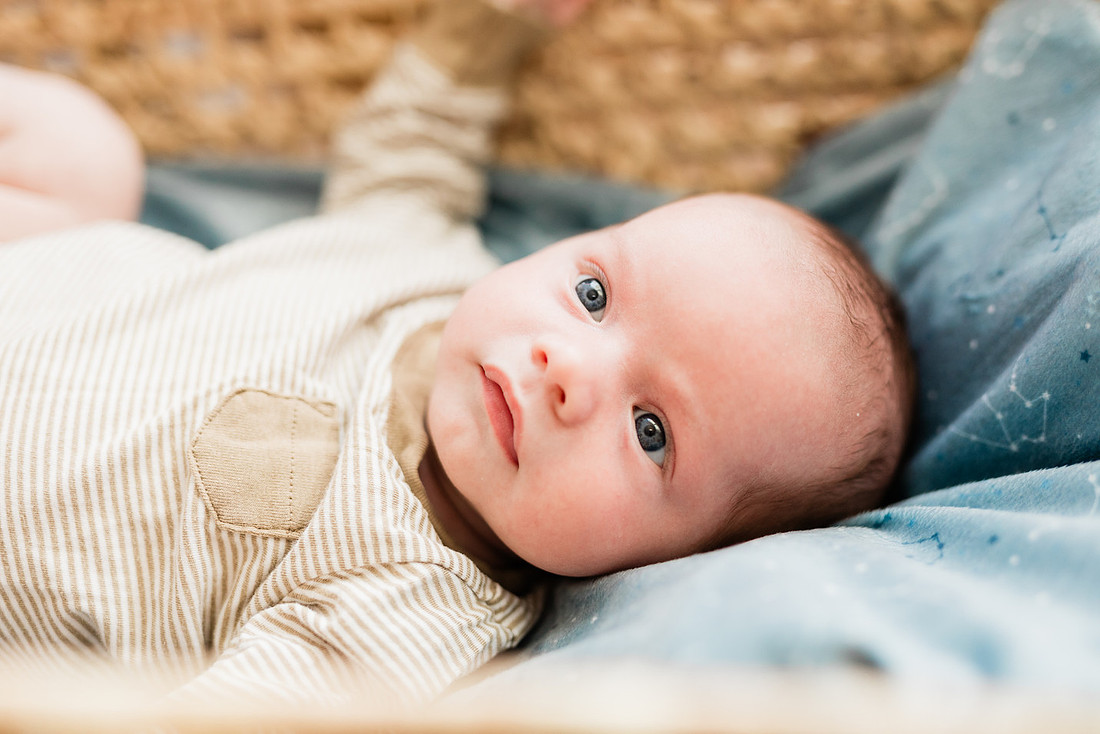Family in their home welcoming baby