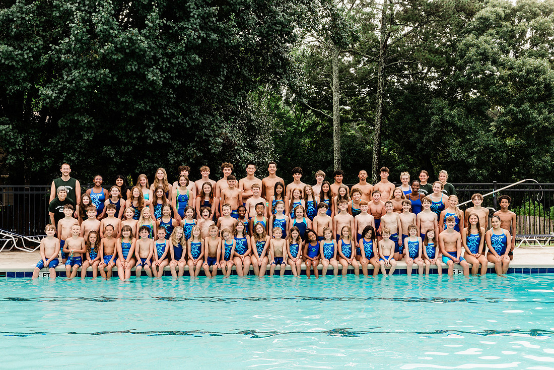 swimmers at swim meets and posing for portraits