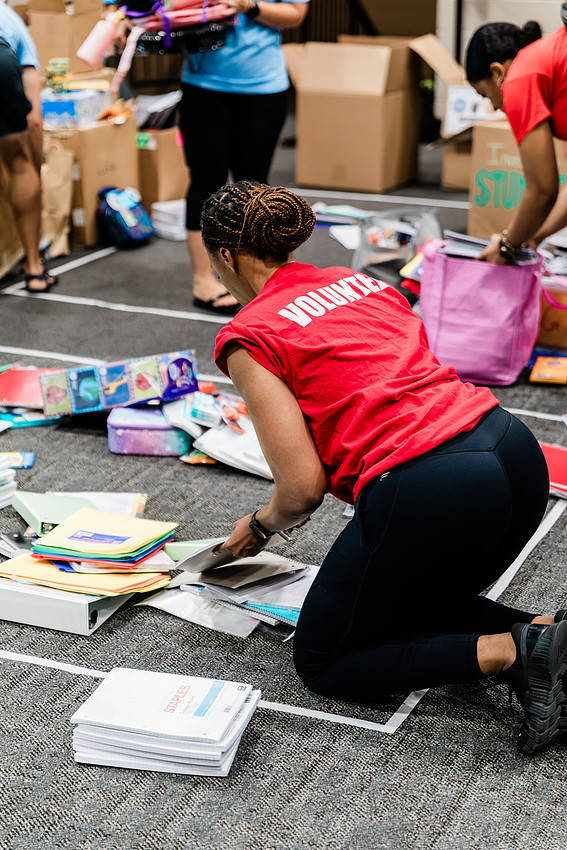 Scenes from KIDS CARE's Backing the Need backpack and school supply drive at the Cobb County Civic Center in Marietta, GA.