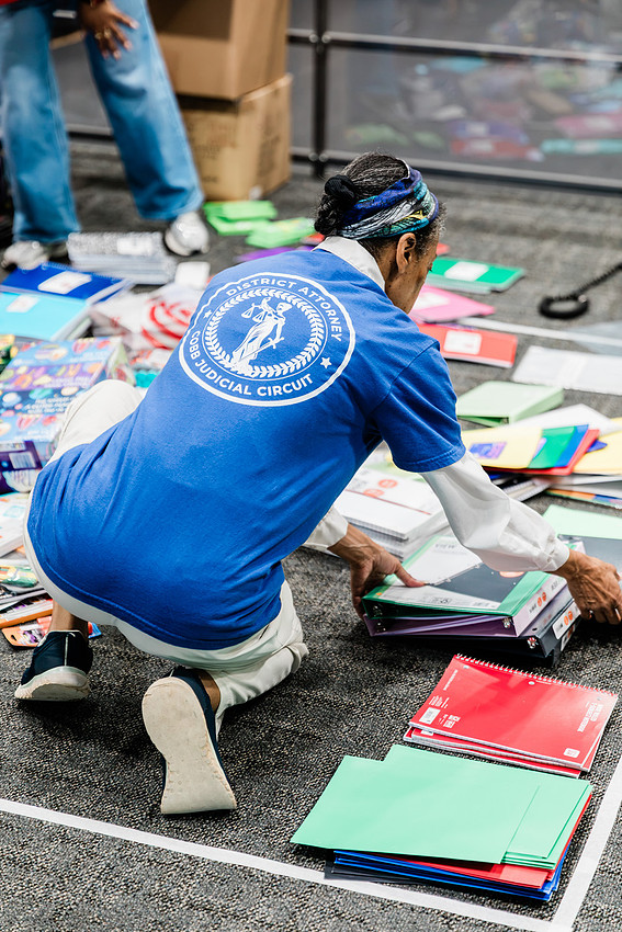 Scenes from KIDS CARE's Backing the Need backpack and school supply drive at the Cobb County Civic Center in Marietta, GA.