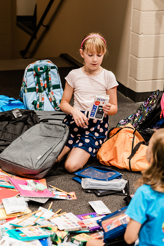 Scenes from KIDS CARE's Backing the Need backpack and school supply drive at the Cobb County Civic Center in Marietta, GA.