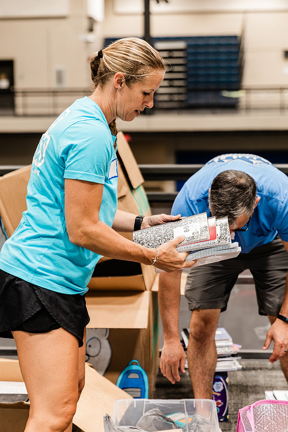 Scenes from KIDS CARE's Backing the Need backpack and school supply drive at the Cobb County Civic Center in Marietta, GA.
