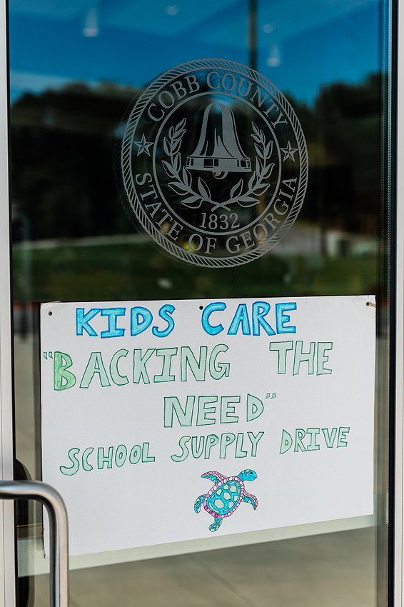 Scenes from KIDS CARE's Backing the Need backpack and school supply drive at the Cobb County Civic Center in Marietta, GA.