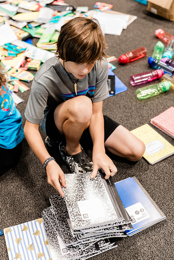 Scenes from KIDS CARE's Backing the Need backpack and school supply drive at the Cobb County Civic Center in Marietta, GA.