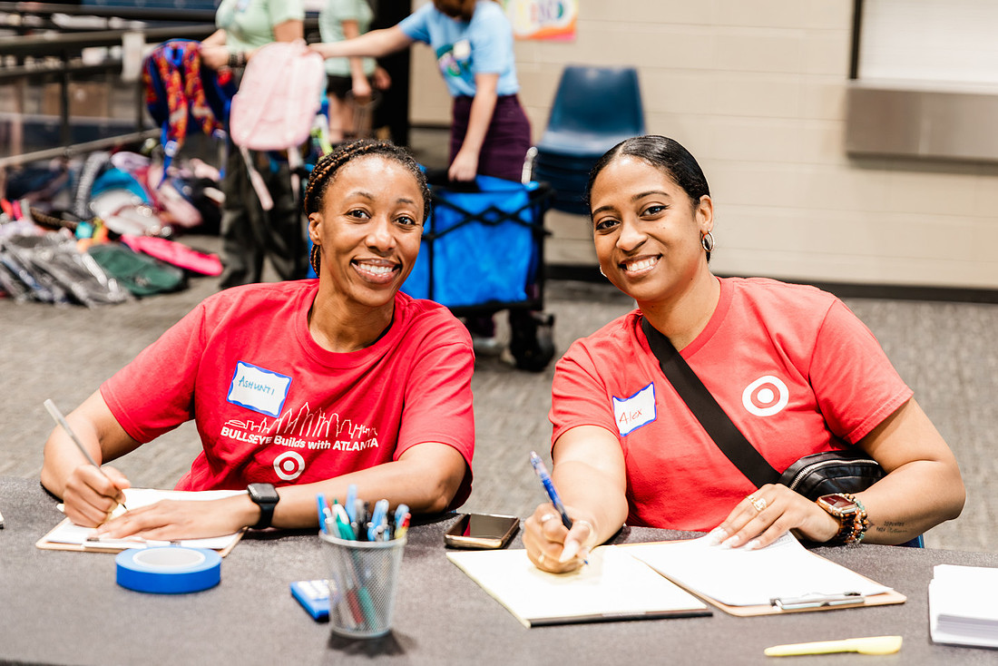 Scenes from KIDS CARE's Backing the Need backpack and school supply drive at the Cobb County Civic Center in Marietta, GA.