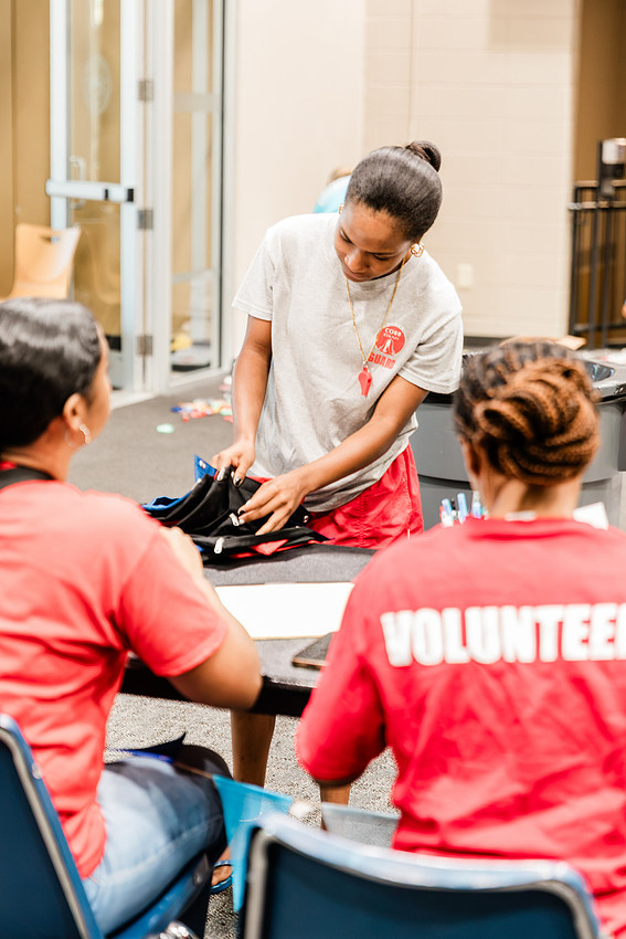 Scenes from KIDS CARE's Backing the Need backpack and school supply drive at the Cobb County Civic Center in Marietta, GA.
