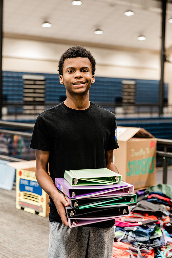 Scenes from KIDS CARE's Backing the Need backpack and school supply drive at the Cobb County Civic Center in Marietta, GA.
