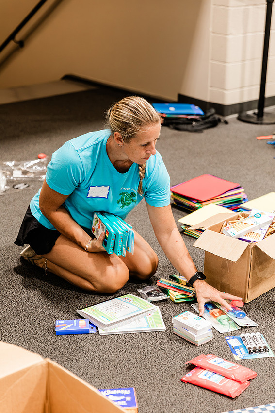 Scenes from KIDS CARE's Backing the Need backpack and school supply drive at the Cobb County Civic Center in Marietta, GA.
