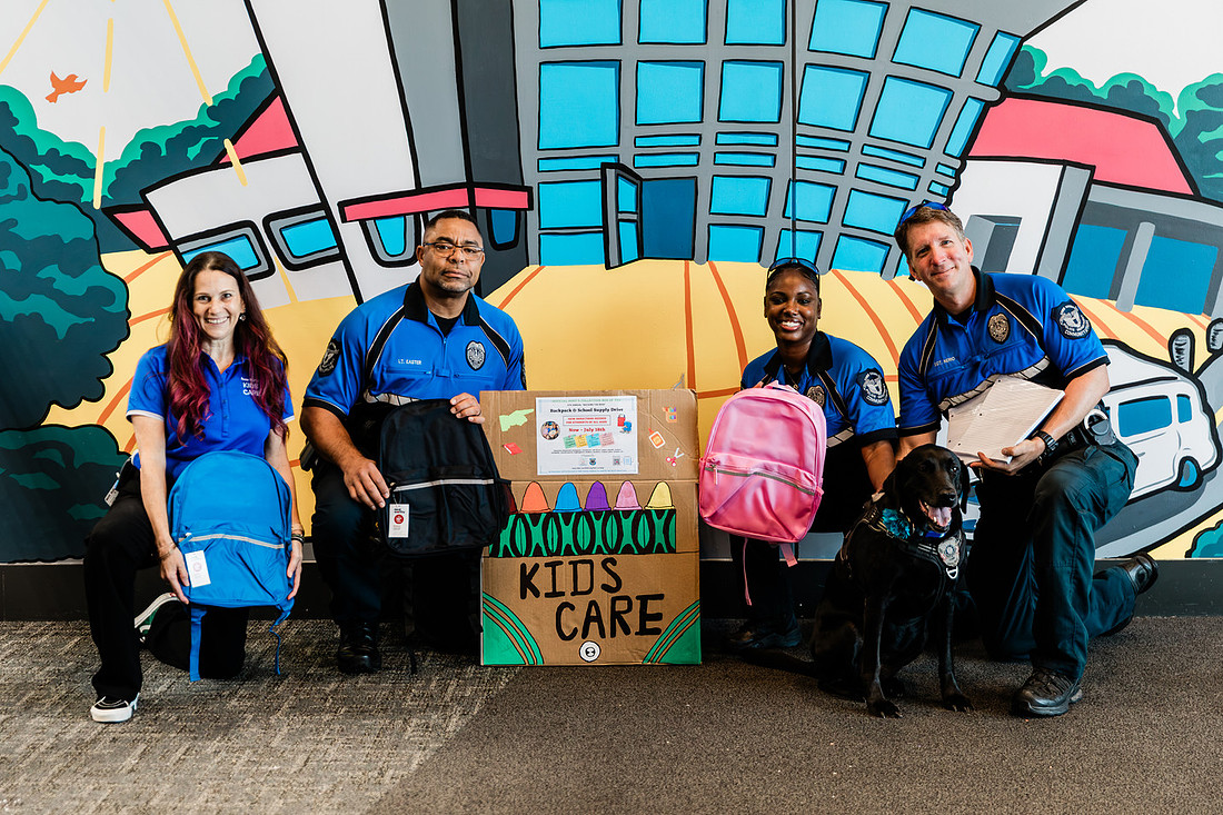 Scenes from KIDS CARE's Backing the Need backpack and school supply drive at the Cobb County Civic Center in Marietta, GA.