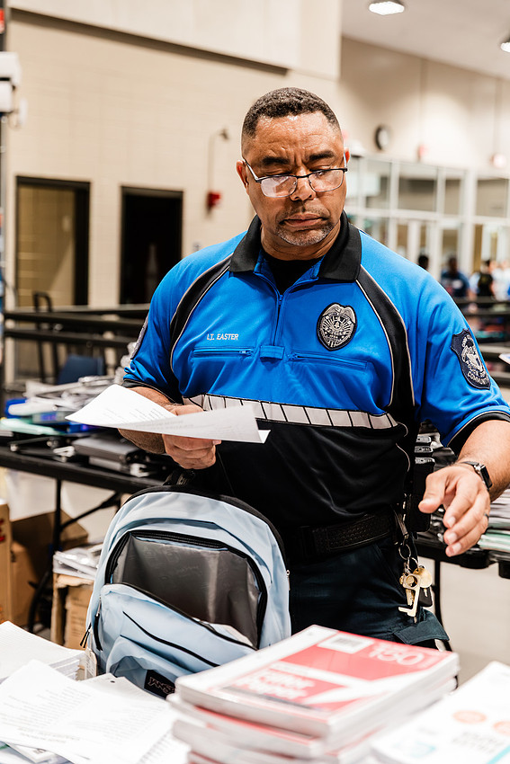 Scenes from KIDS CARE's Backing the Need backpack and school supply drive at the Cobb County Civic Center in Marietta, GA.
