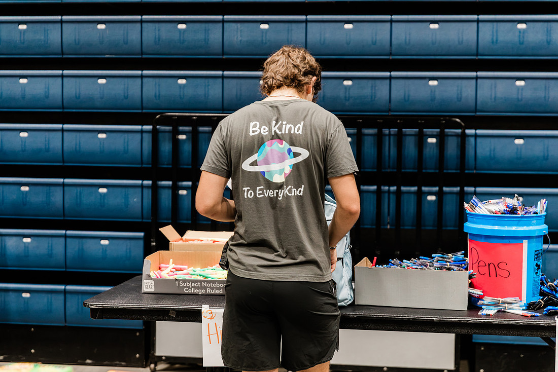 Scenes from KIDS CARE's Backing the Need backpack and school supply drive at the Cobb County Civic Center in Marietta, GA.