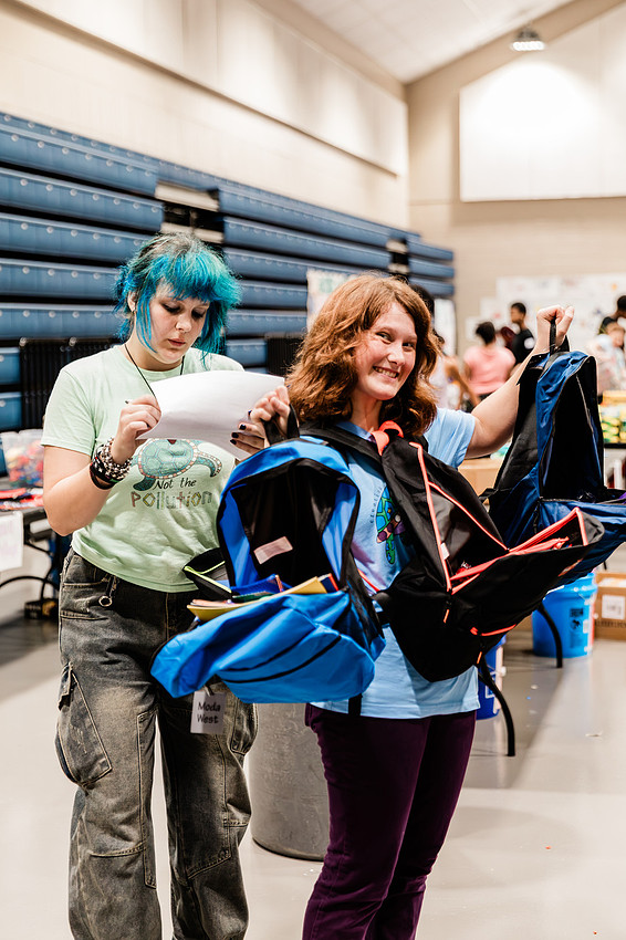 Scenes from KIDS CARE's Backing the Need backpack and school supply drive at the Cobb County Civic Center in Marietta, GA.