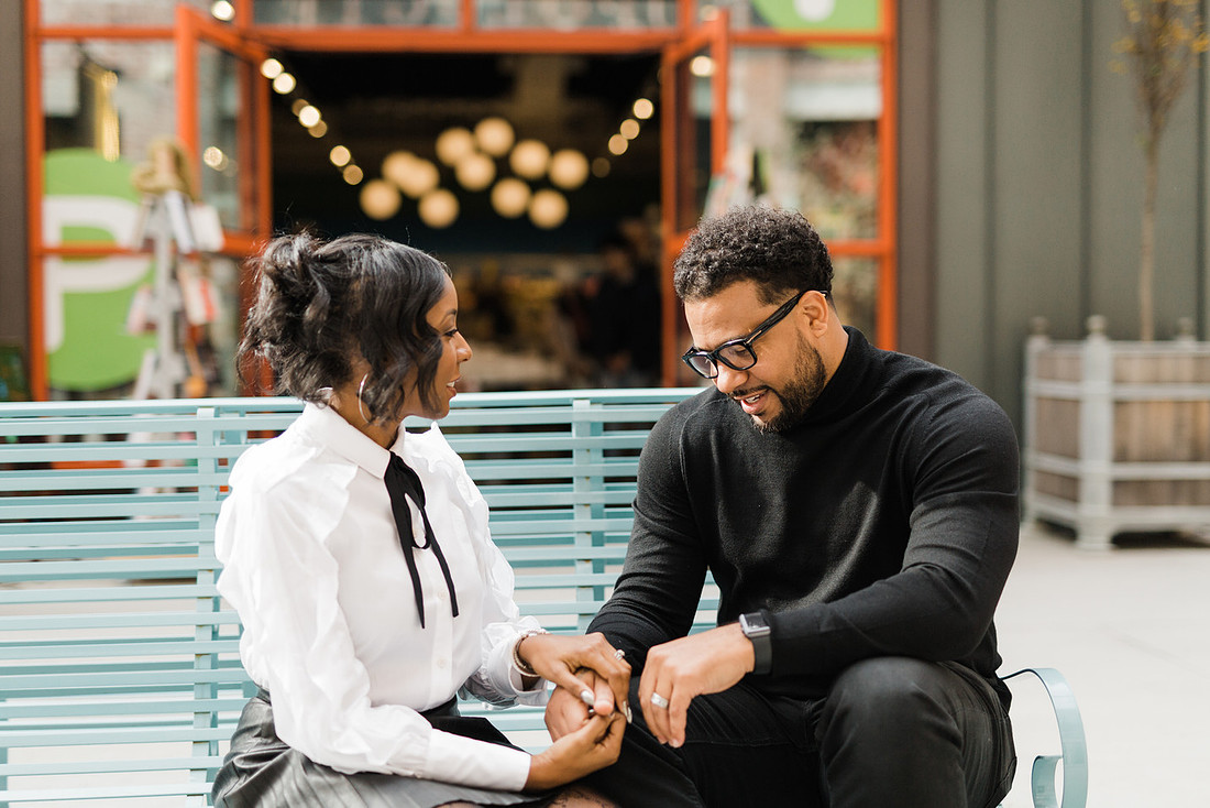 Joyful family moment captured outdoors at Ponce City Market during the holidays.