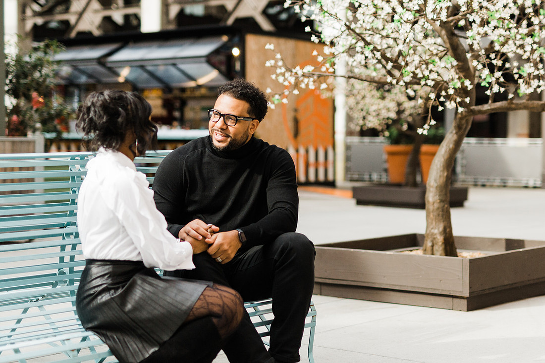 Joyful family moment captured outdoors at Ponce City Market during the holidays.