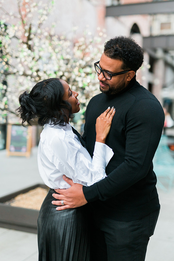 Joyful family moment captured outdoors at Ponce City Market during the holidays.