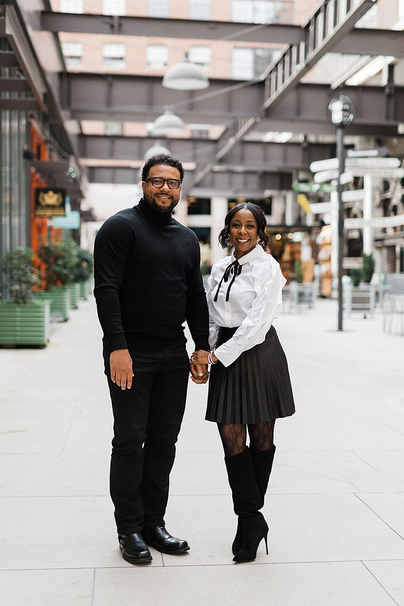 Joyful family moment captured outdoors at Ponce City Market during the holidays.