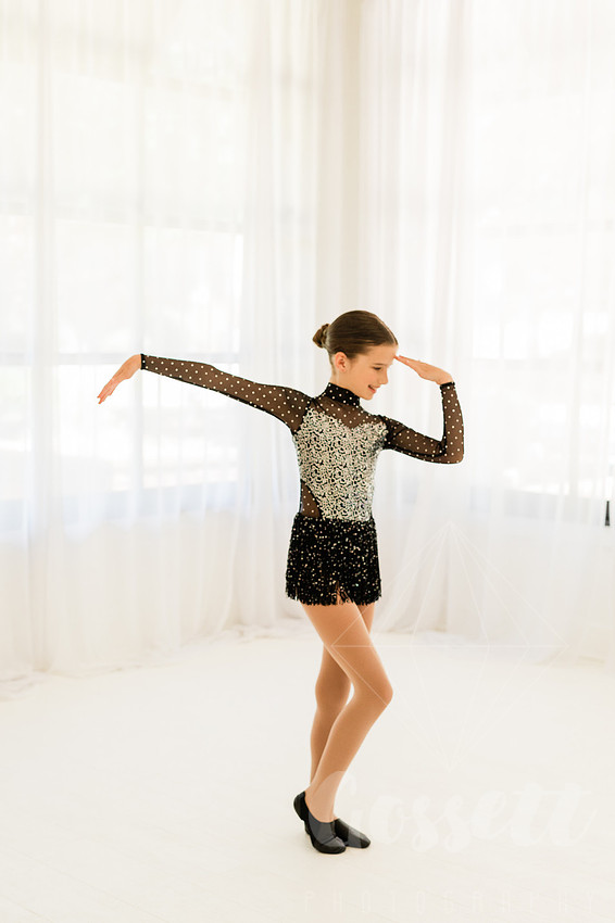 Ballerinas pose in a natural light studio